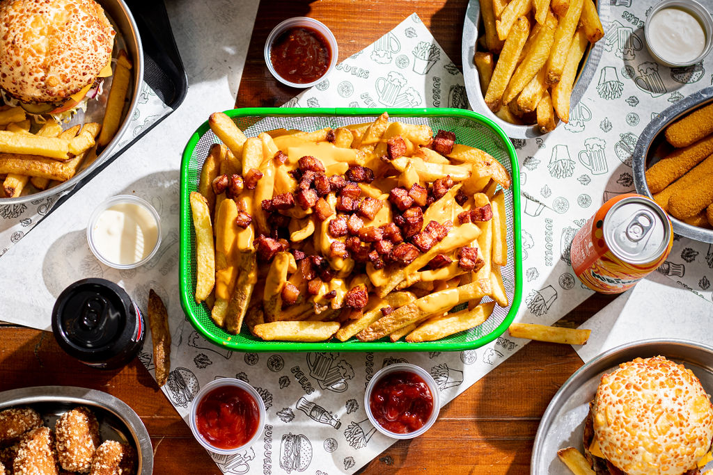 Papas con bacon y cheese